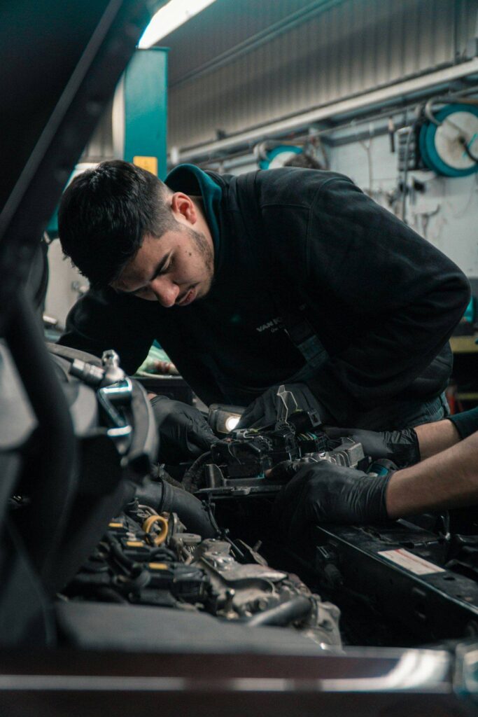 Technician working on a diesel engine